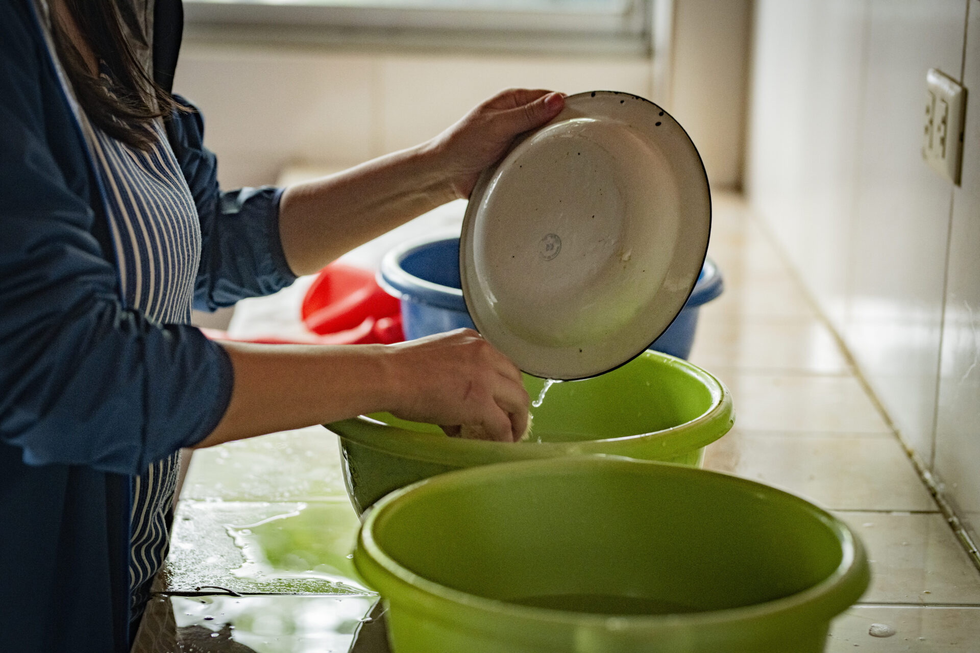 Técnica de baldes en la estación de lavado
